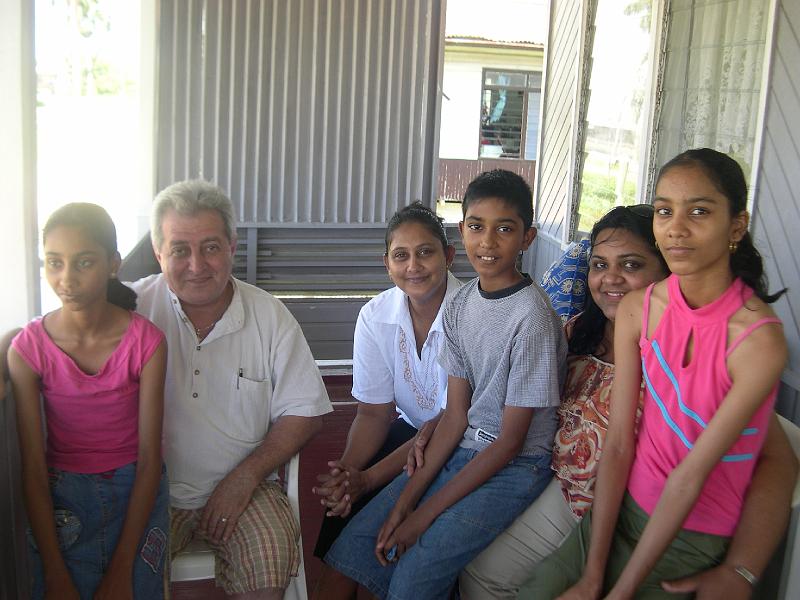 Vinod's 003 - on the porch with family